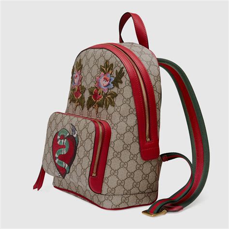 gg e com bollore gucci|Gucci emblem backpack.